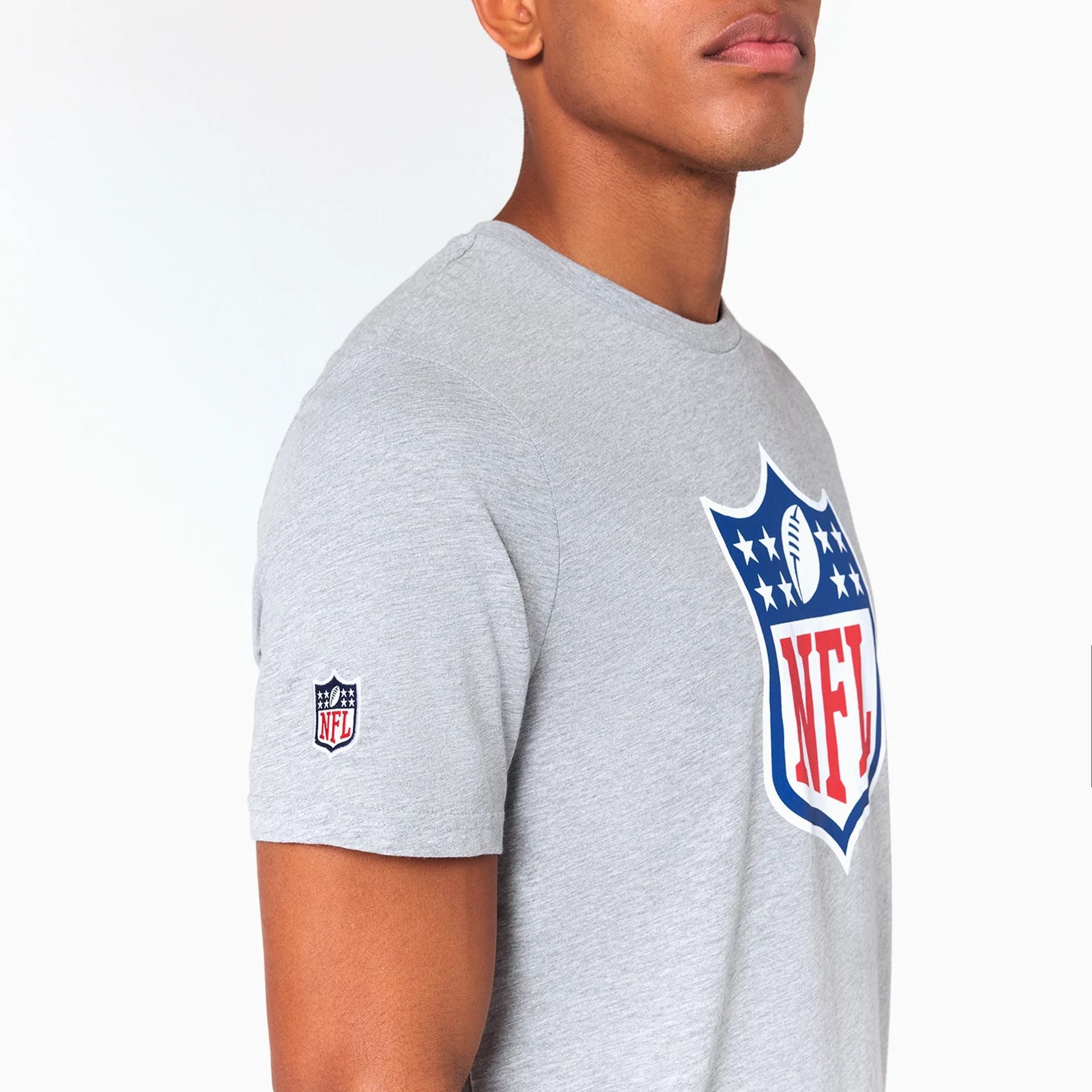 The Male model is wearing NFL Shield Logo NFL Grey T-Shirt 4