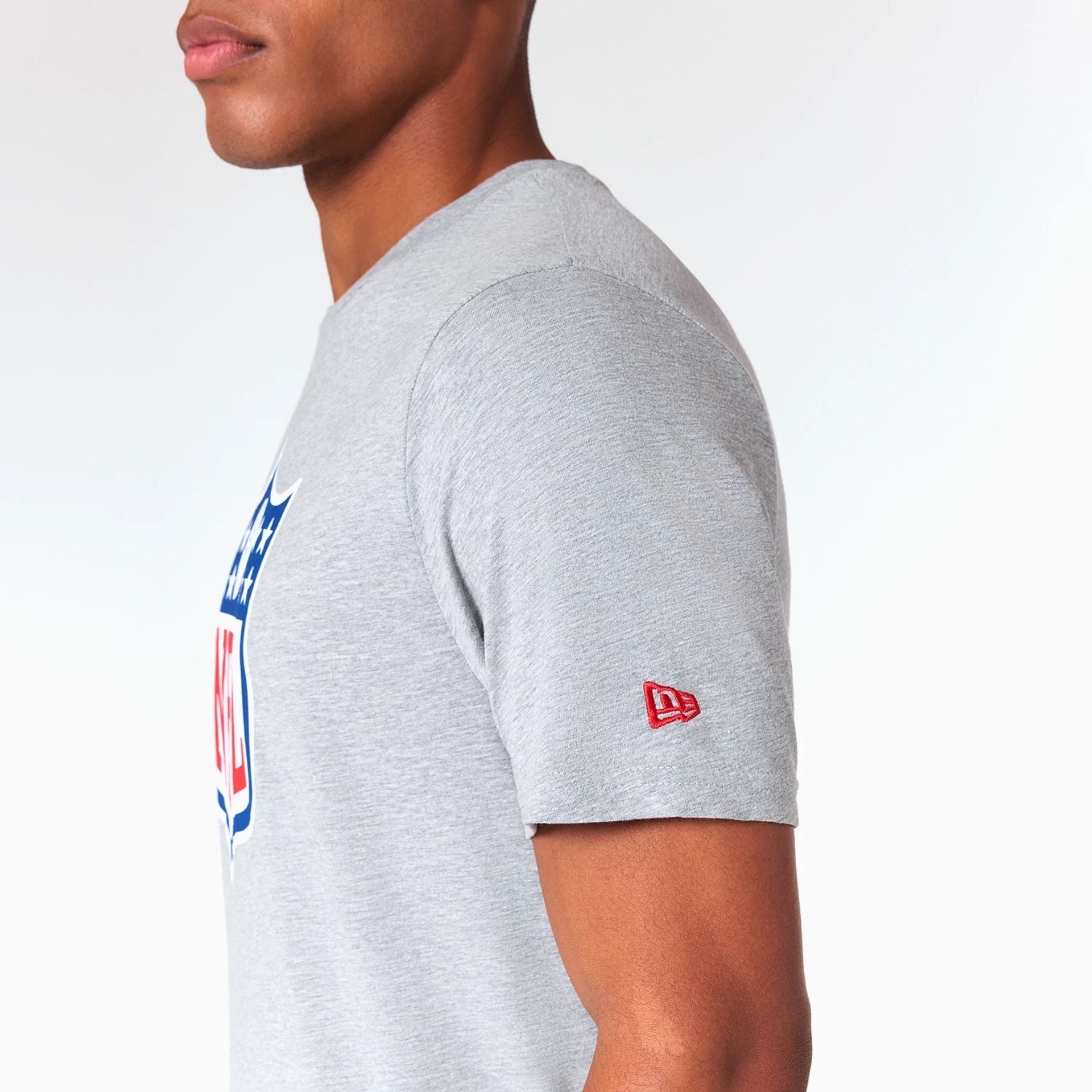 The Male model is wearing NFL Shield Logo NFL Grey T-Shirt 5