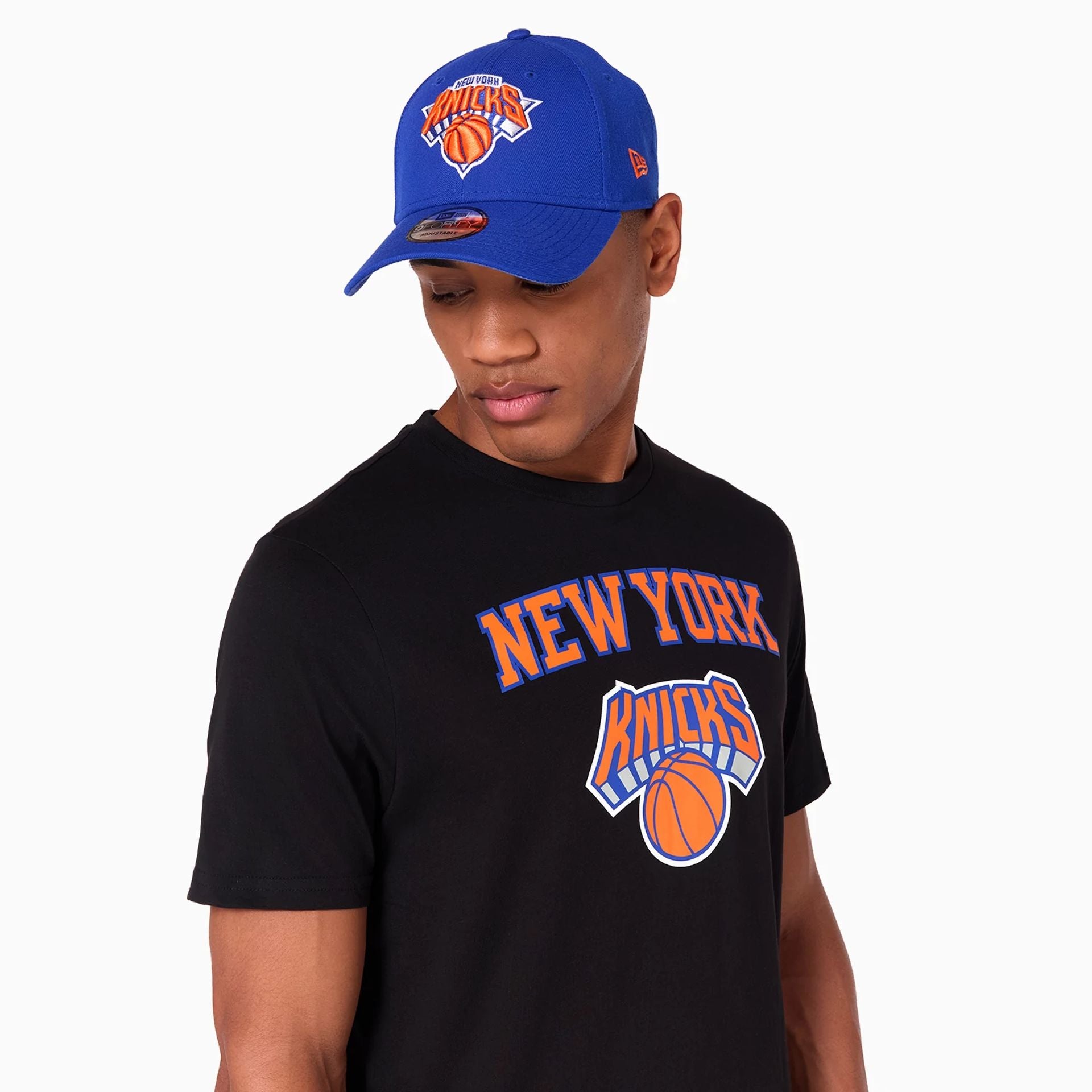 The Male model is wearing New York Knicks NBA Black T-Shirt 5