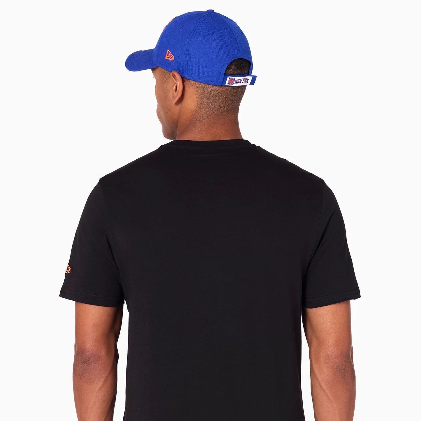 The Male model is wearing New York Knicks NBA Black T-Shirt 6