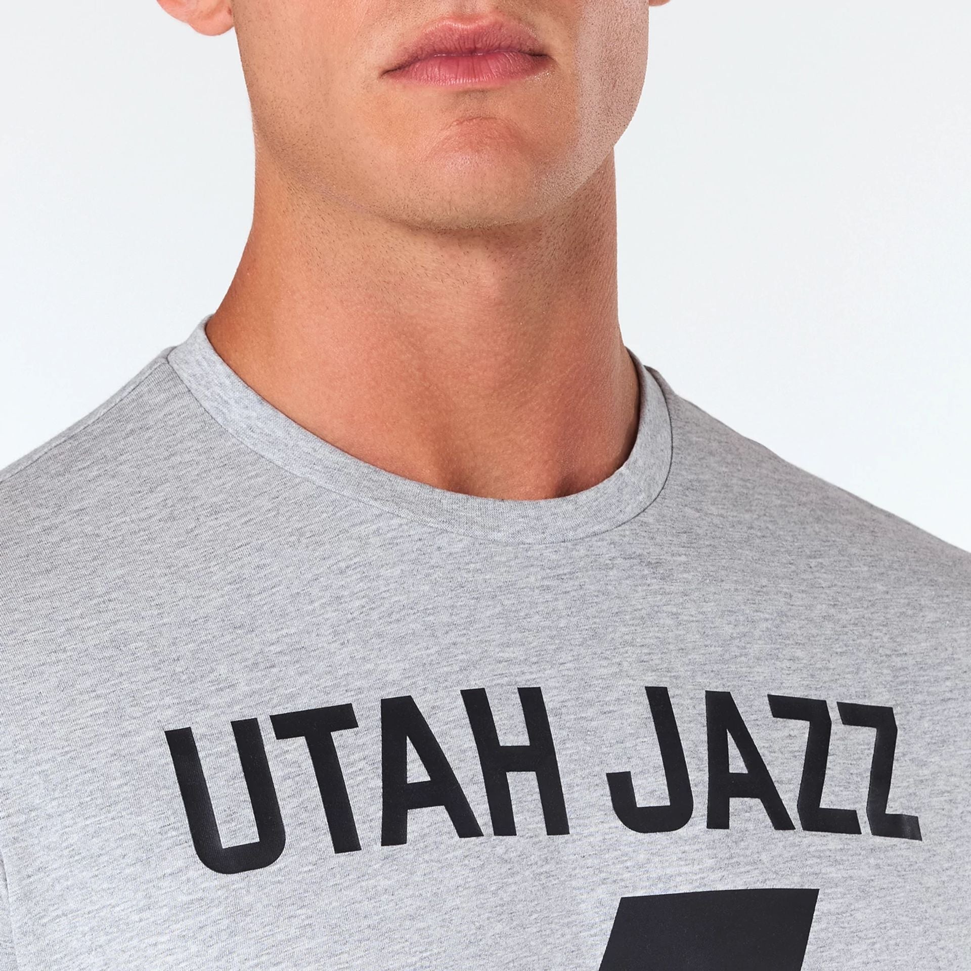 The Male model is wearing Utah Jazz NBA Grey T-Shirt 3