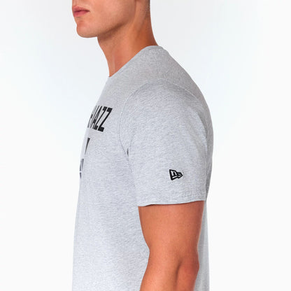 The Male model is wearing Utah Jazz NBA Grey T-Shirt 4