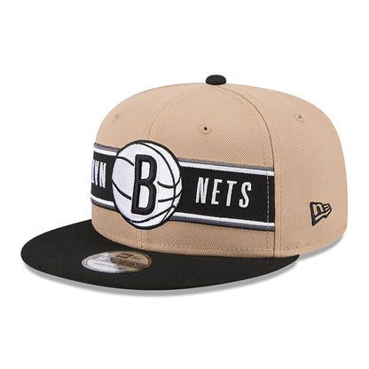 This is a Brooklyn Nets NBA Draft Beige 9FIFTY Snapback Cap 1