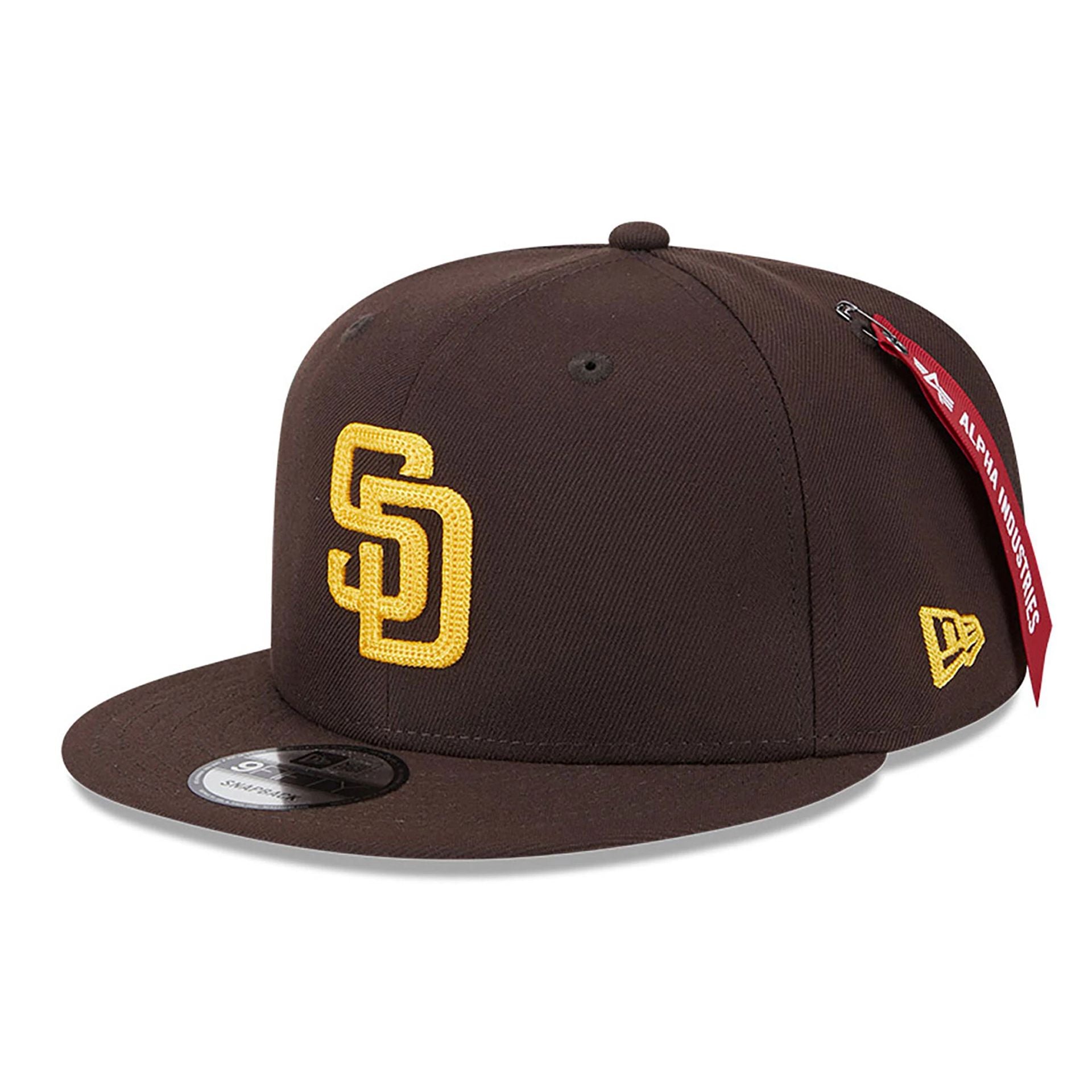 This is a San Diego Padres MLB x Alpha Industries Dark Brown 9FIFTY Snapback Adjustable Cap 1