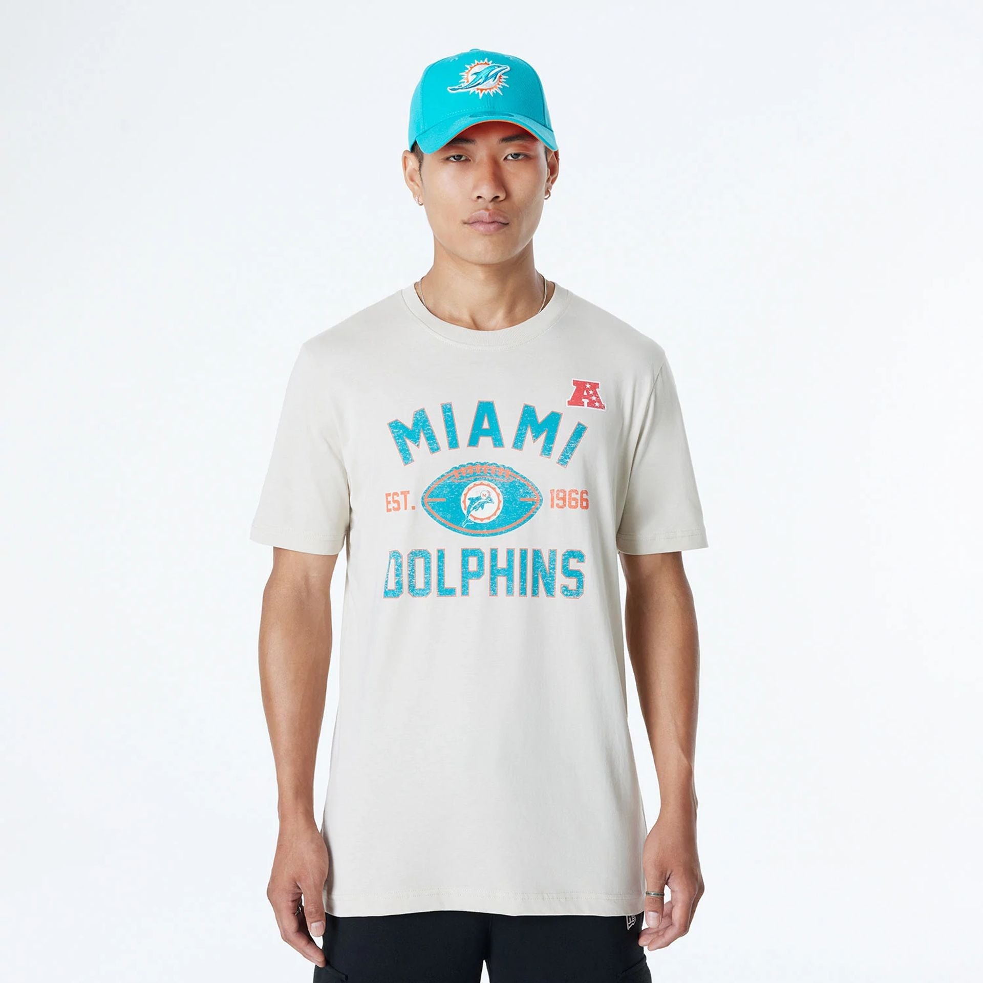 The Male model is wearing Miami Dolphins NFL 3rd Down Historic Light Beige T-Shirt  1