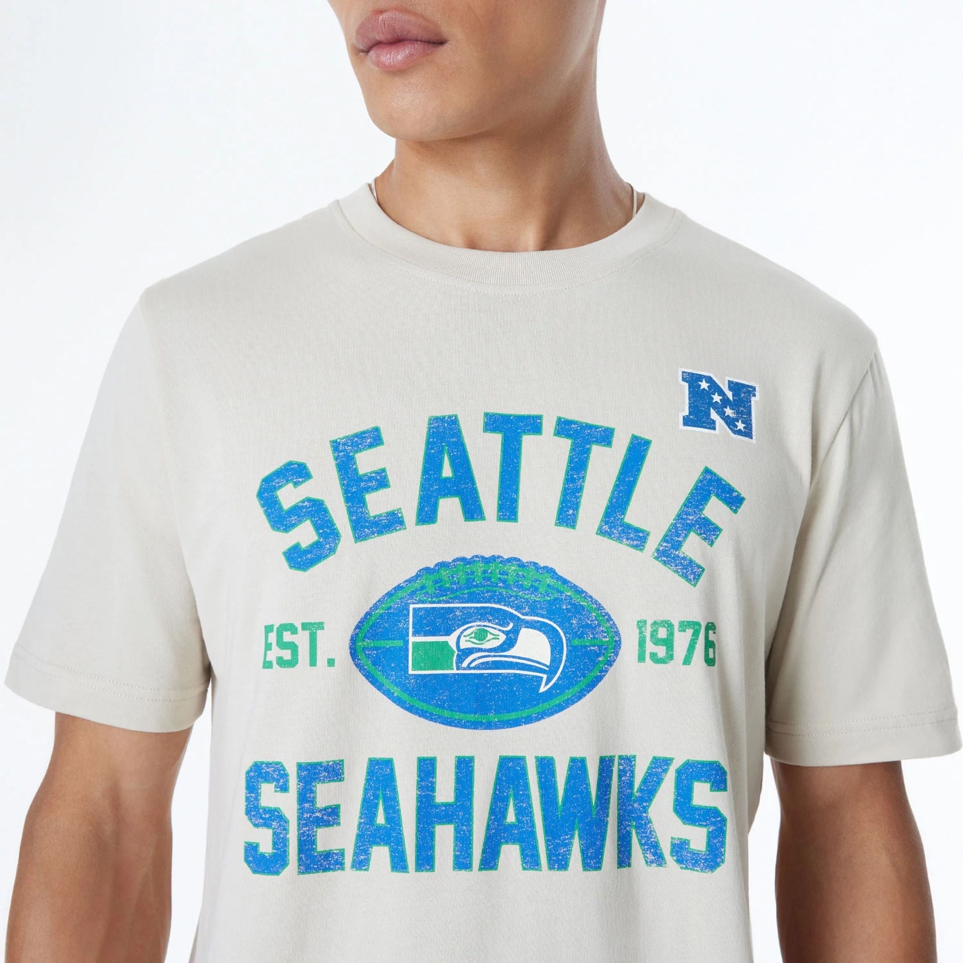 The Male model is wearing Seattle Seahawks NFL 3rd Down Historic Light Beige T-Shirt  5