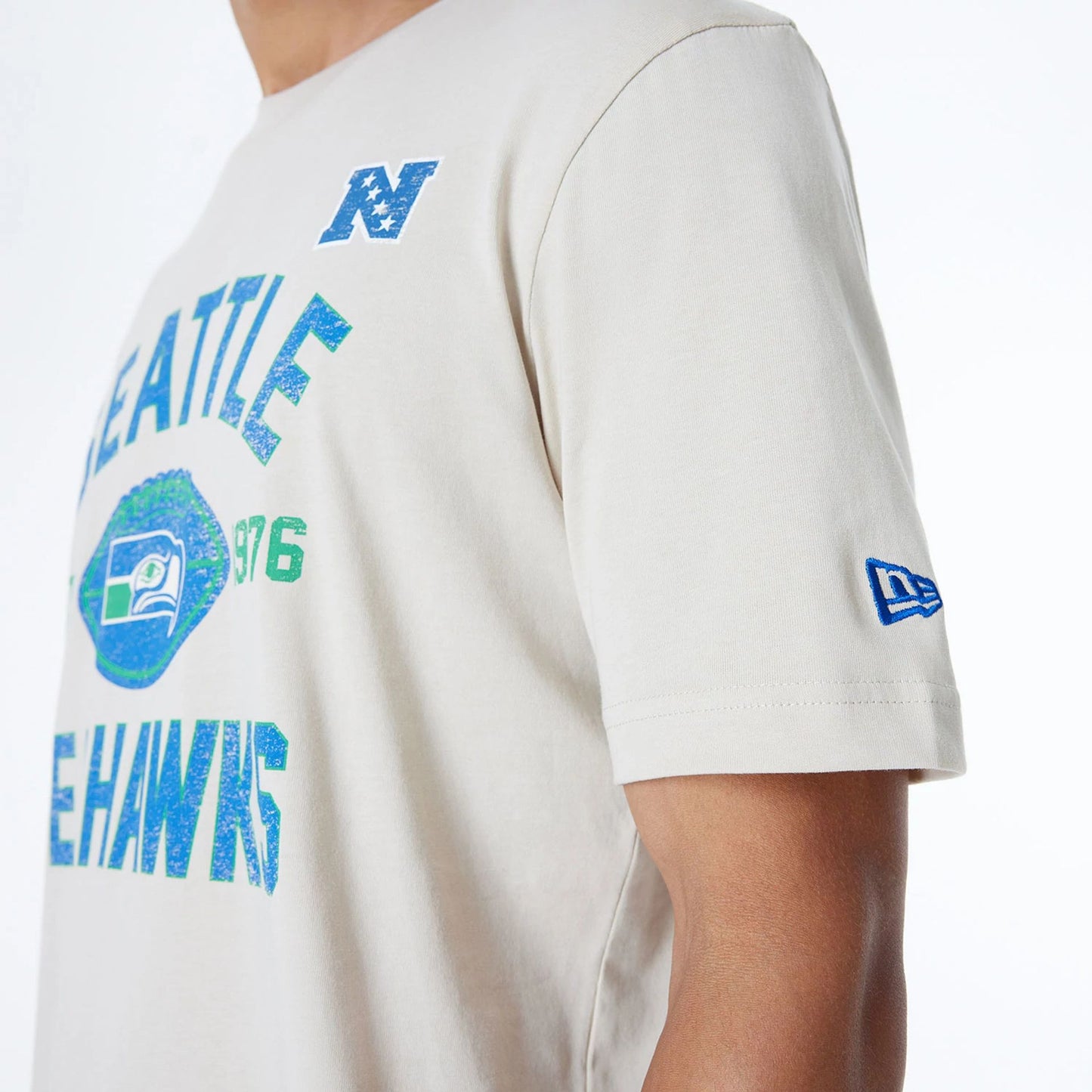 The Male model is wearing Seattle Seahawks NFL 3rd Down Historic Light Beige T-Shirt  4