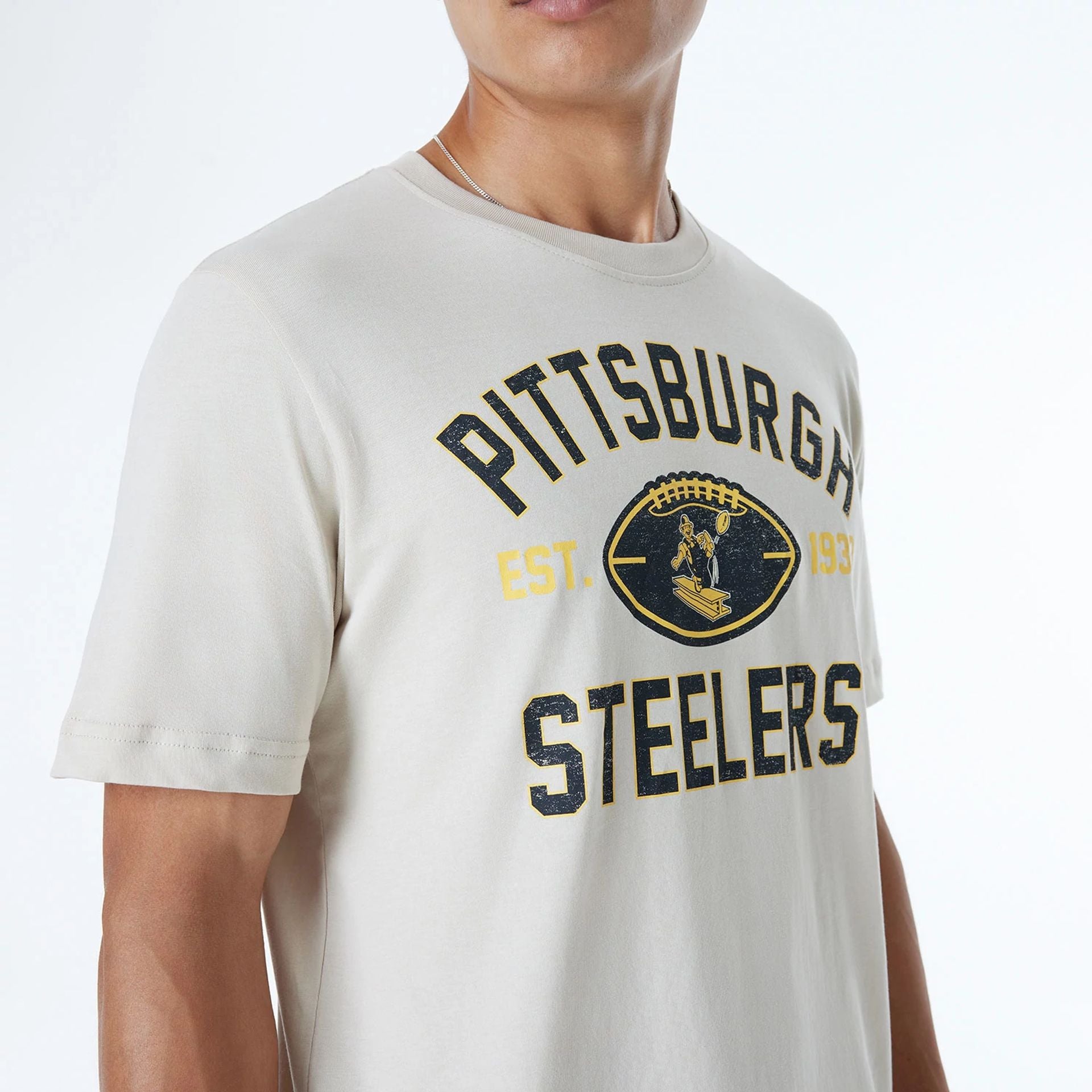 The Male model is wearing Pittsburgh Steelers NFL 3rd Down Historic Light Beige T-Shirt  5