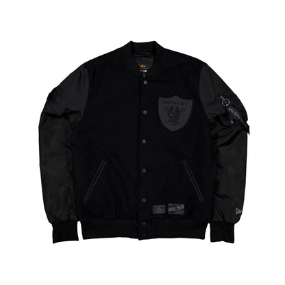 The Male model is wearing Las Vegas Raiders NFL x Alpha Industries Black On Black Varsity Jacket 1