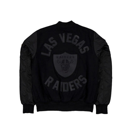 The Male model is wearing Las Vegas Raiders NFL x Alpha Industries Black On Black Varsity Jacket 2