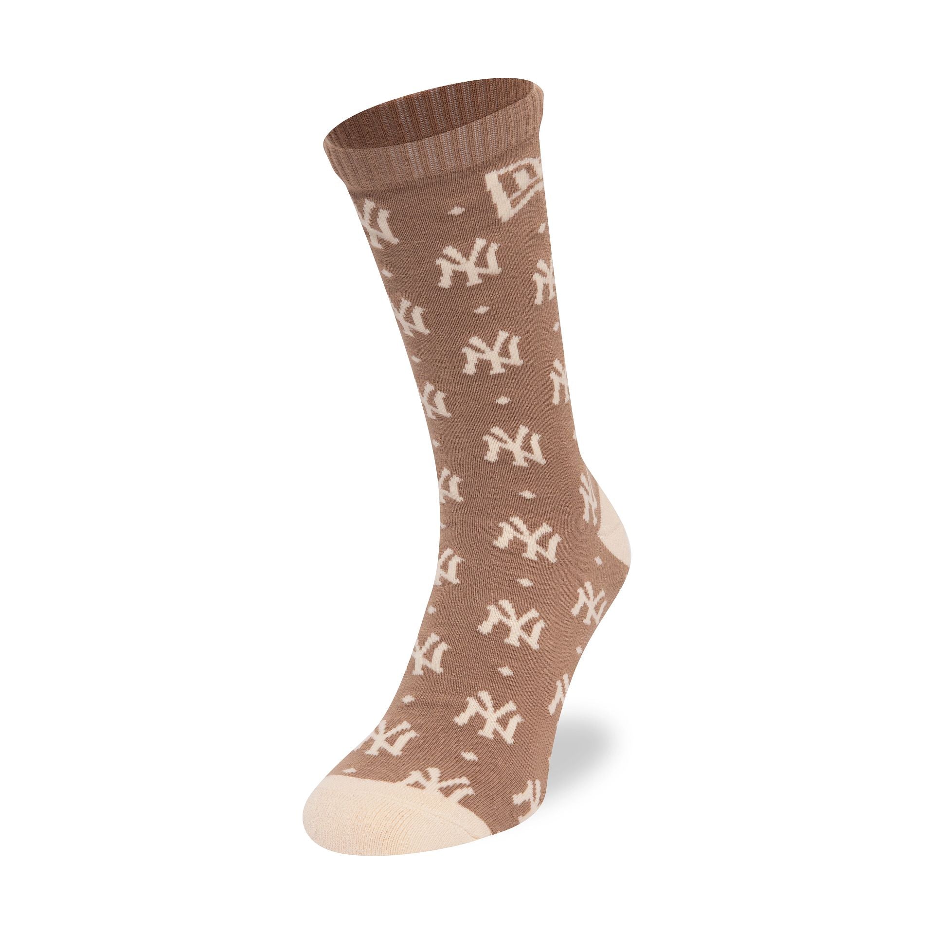 This is a New York Yankees Monogram Beige Crew Socks 1