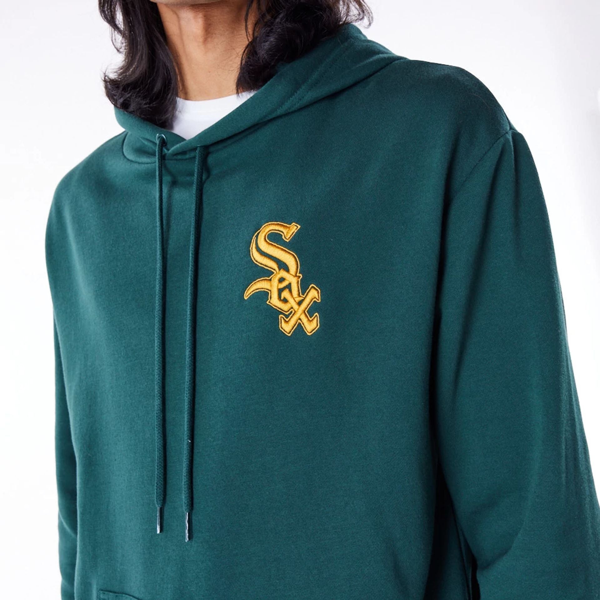 The Male model is wearing Chicago White Sox League Essential Dark Green Oversized Pullover Hoodie 2