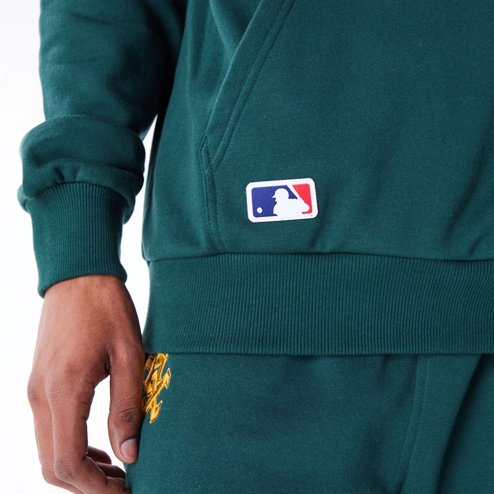 The Male model is wearing Chicago White Sox League Essential Dark Green Oversized Pullover Hoodie 6