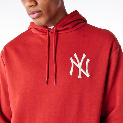 The Male model is wearing New York Yankees League Essential Red Oversized Pullover Hoodie 5