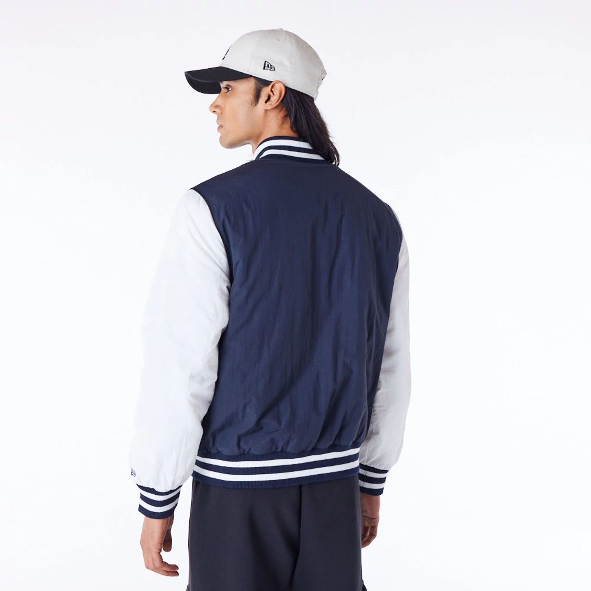 The Male model is wearing LA Dodgers MLB Wordmark Navy Bomber Jacket 7