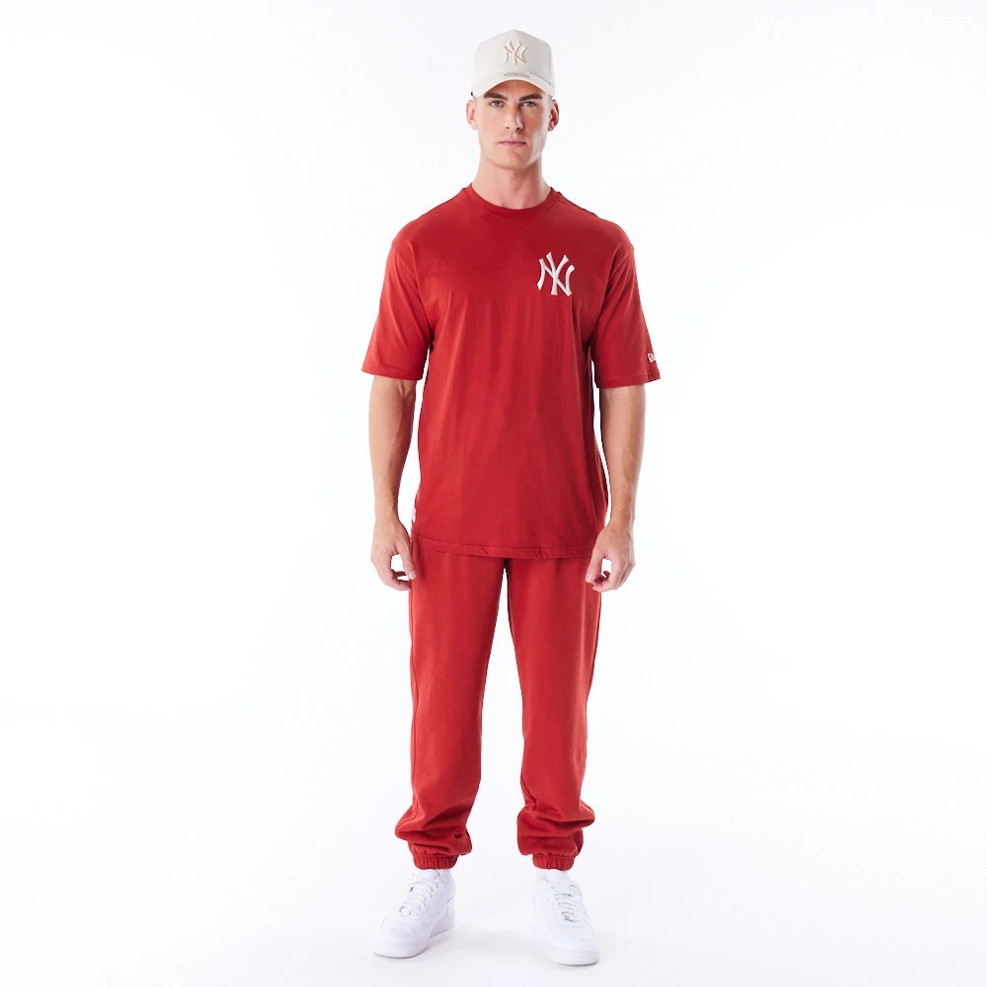 The Male model is wearing New York Yankees League Essential Red Oversized T-Shirt 10