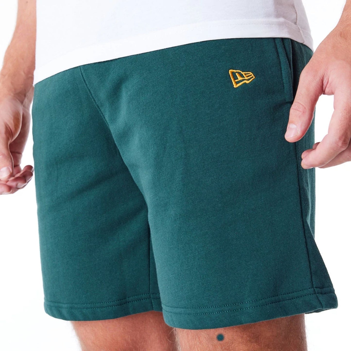 The Male model is wearing Chicago White Sox League Essential Dark Green Shorts 4