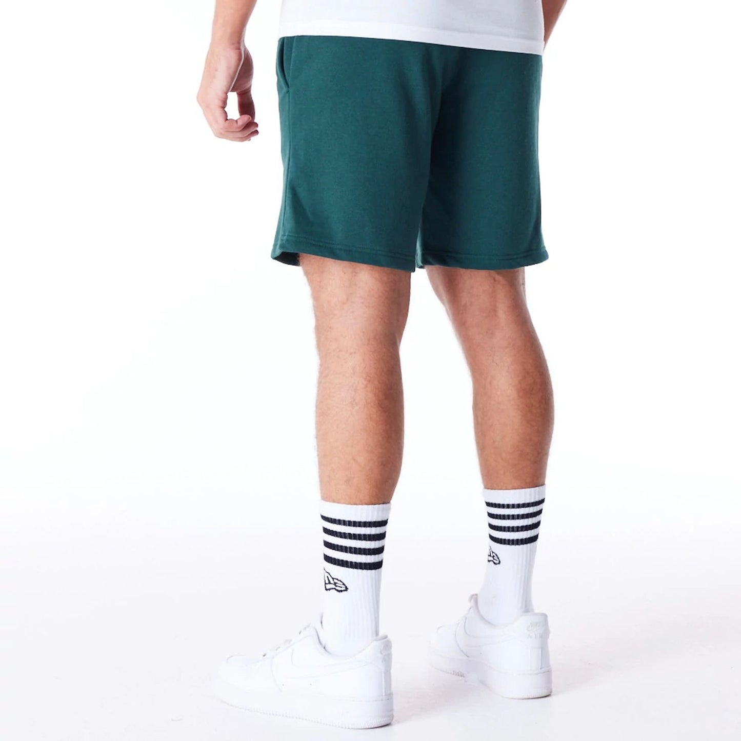 The Male model is wearing Chicago White Sox League Essential Dark Green Shorts 7