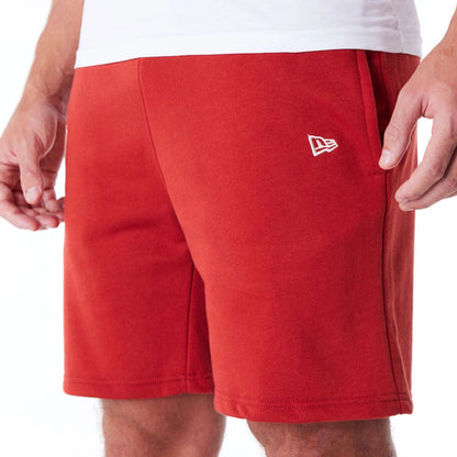 The Male model is wearing New York Yankees League Essential Red Shorts 6