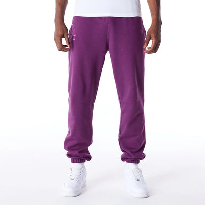 The Male model is wearing LA Dodgers League Essential Dark Purple Fleece Joggers 7