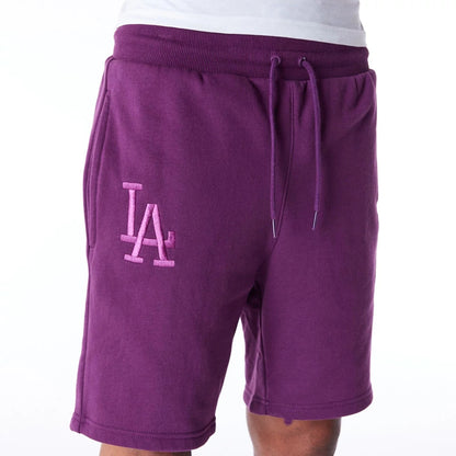 The Male model is wearing LA Dodgers League Essential Dark Purple Shorts 5