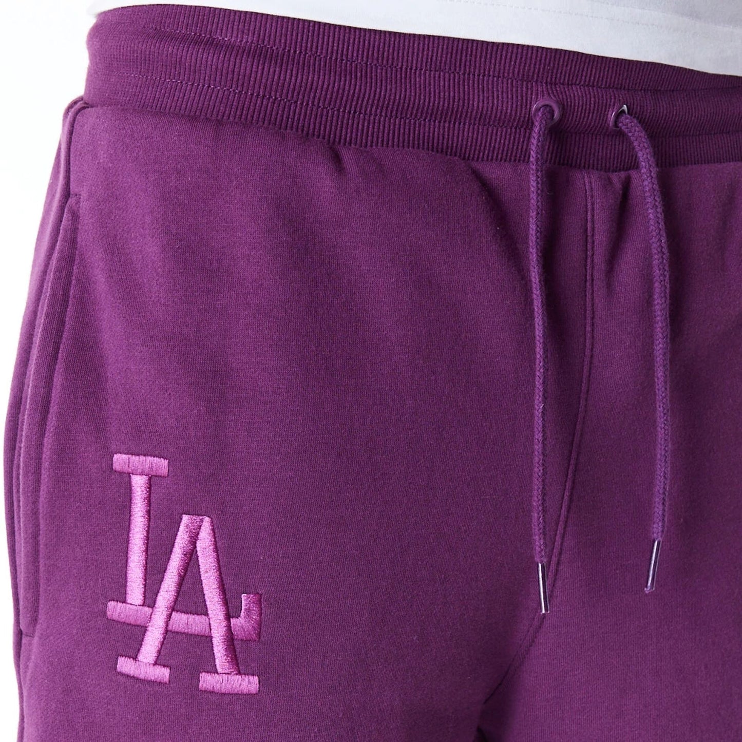 The Male model is wearing LA Dodgers League Essential Dark Purple Shorts 6