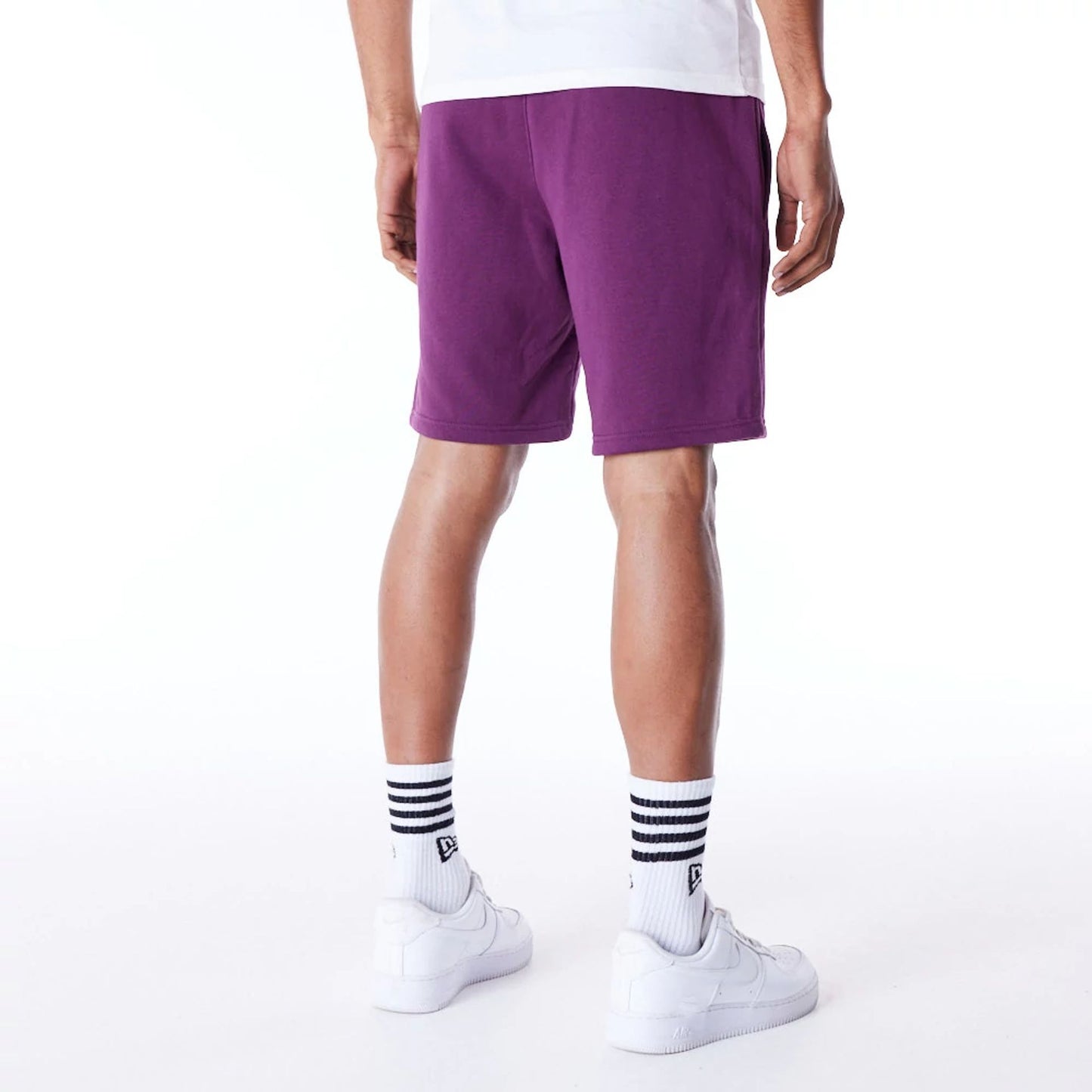 The Male model is wearing LA Dodgers League Essential Dark Purple Shorts 7