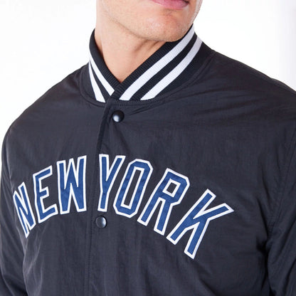 The Male model is wearing New York Yankees MLB Wordmark Black Bomber Jacket 6