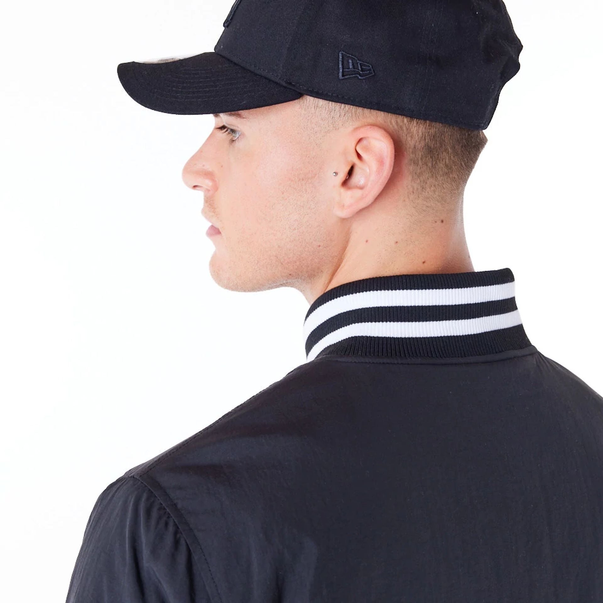 The Male model is wearing New York Yankees MLB Wordmark Black Bomber Jacket 7