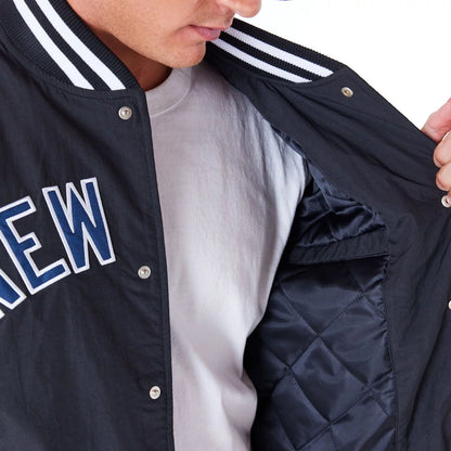 The Male model is wearing New York Yankees MLB Wordmark Black Bomber Jacket 5