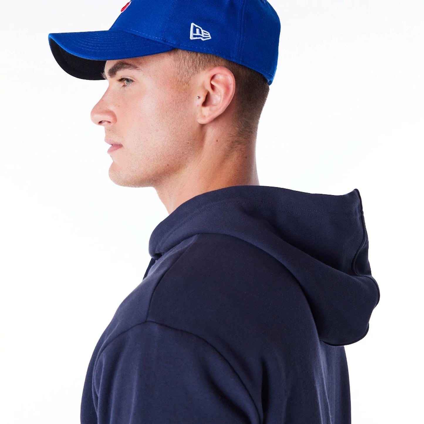 The Male model is wearing Chicago Cubs MLB Food Graphic Navy Oversized Pullover Hoodie 5