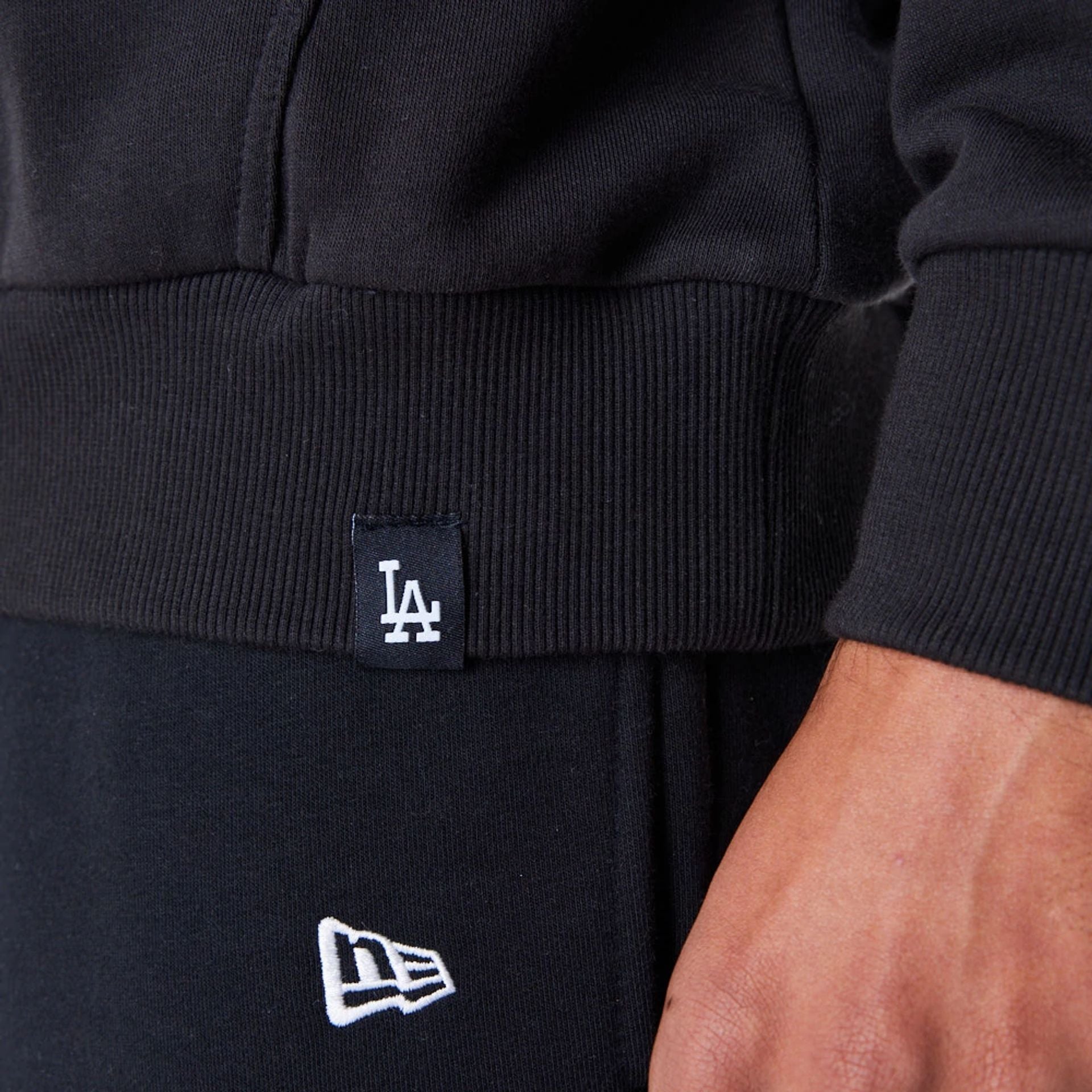 The Male model is wearing LA Dodgers MLB Graphic Black Oversized Pullover Hoodie 7