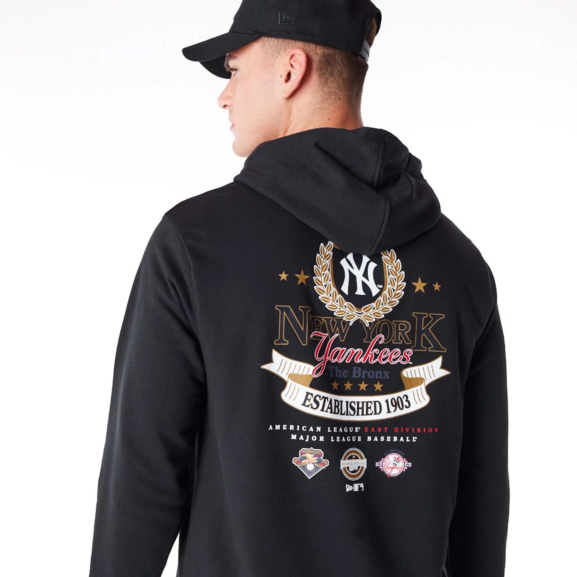 The Male model is wearing New York Yankees MLB Badge Graphic Black Pullover Hoodie 2