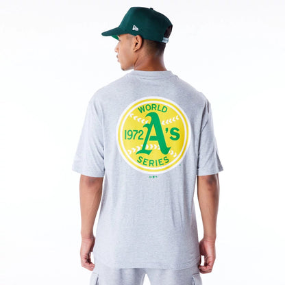 The Male model is wearing Oakland Athletics MLB World Series Grey Oversized T-Shirt  1