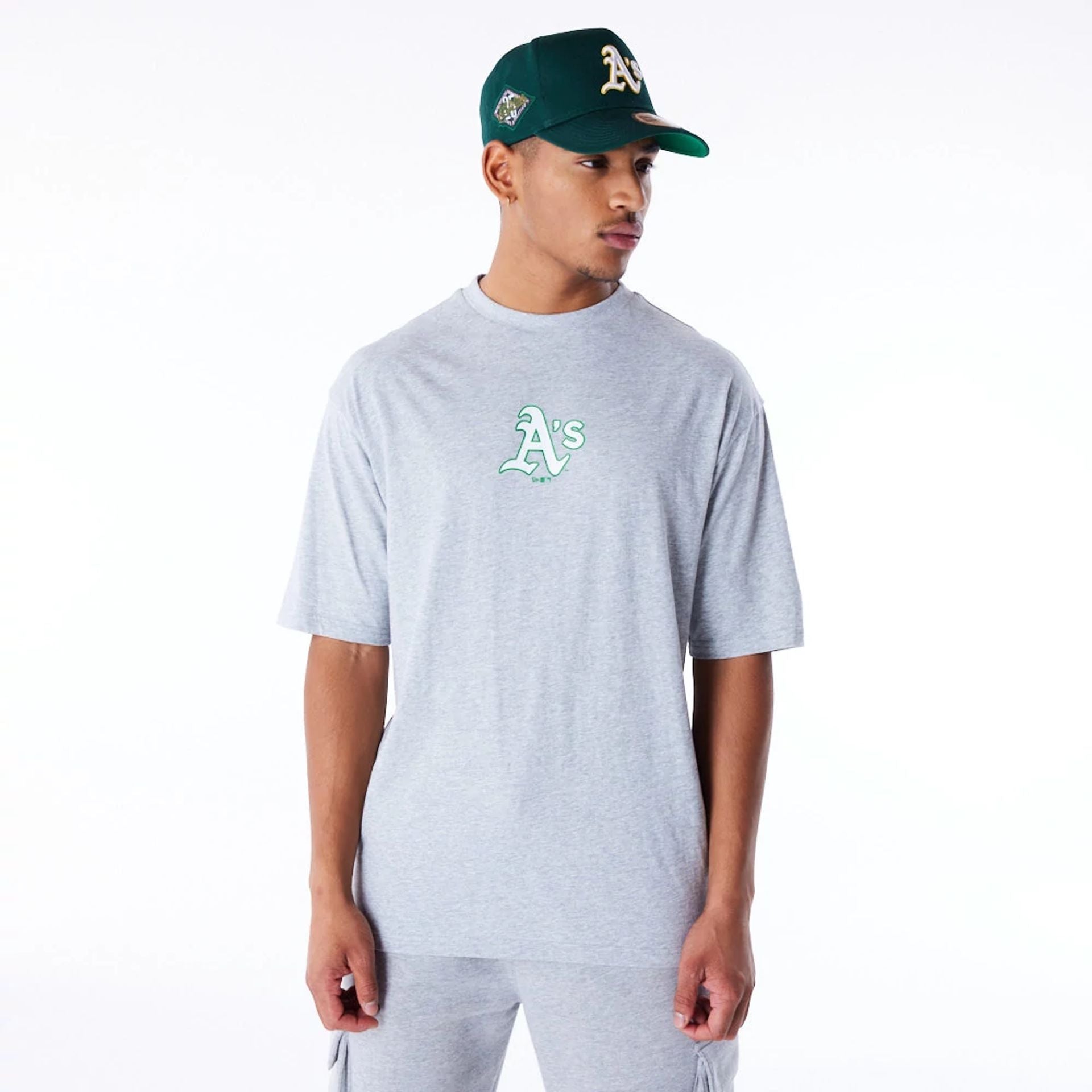 The Male model is wearing Oakland Athletics MLB World Series Grey Oversized T-Shirt  2