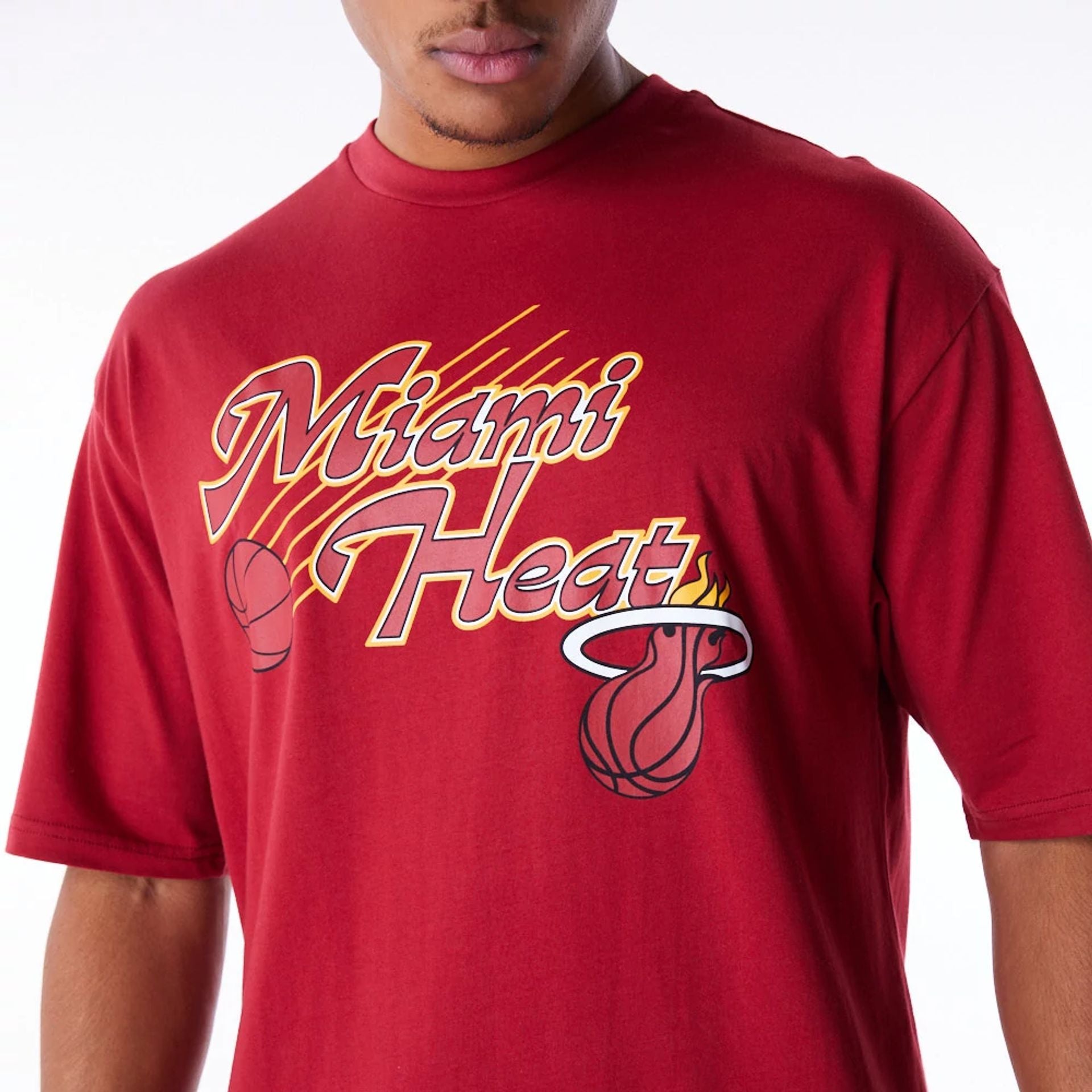 The Male model is wearing Miami Heat NBA Script Dark Red Oversized T-Shirt 5