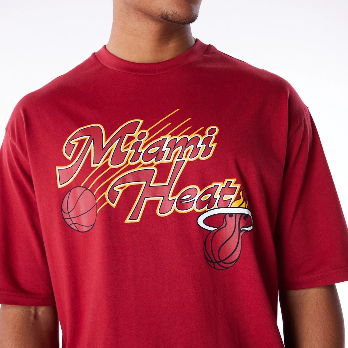 The Male model is wearing Miami Heat NBA Script Dark Red Oversized T-Shirt 2