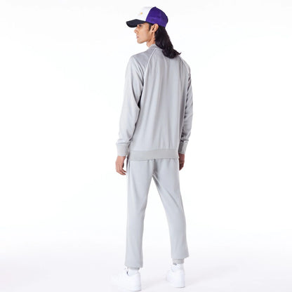 The Male model is wearing LA Lakers NBA Script Grey Track Jacket 6