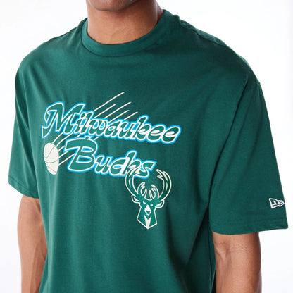 The Male model is wearing Milwaukee Bucks NBA Script Dark Green Oversized T-Shirt 6