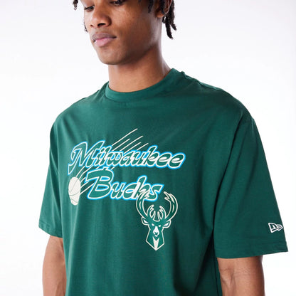 The Male model is wearing Milwaukee Bucks NBA Script Dark Green Oversized T-Shirt 4