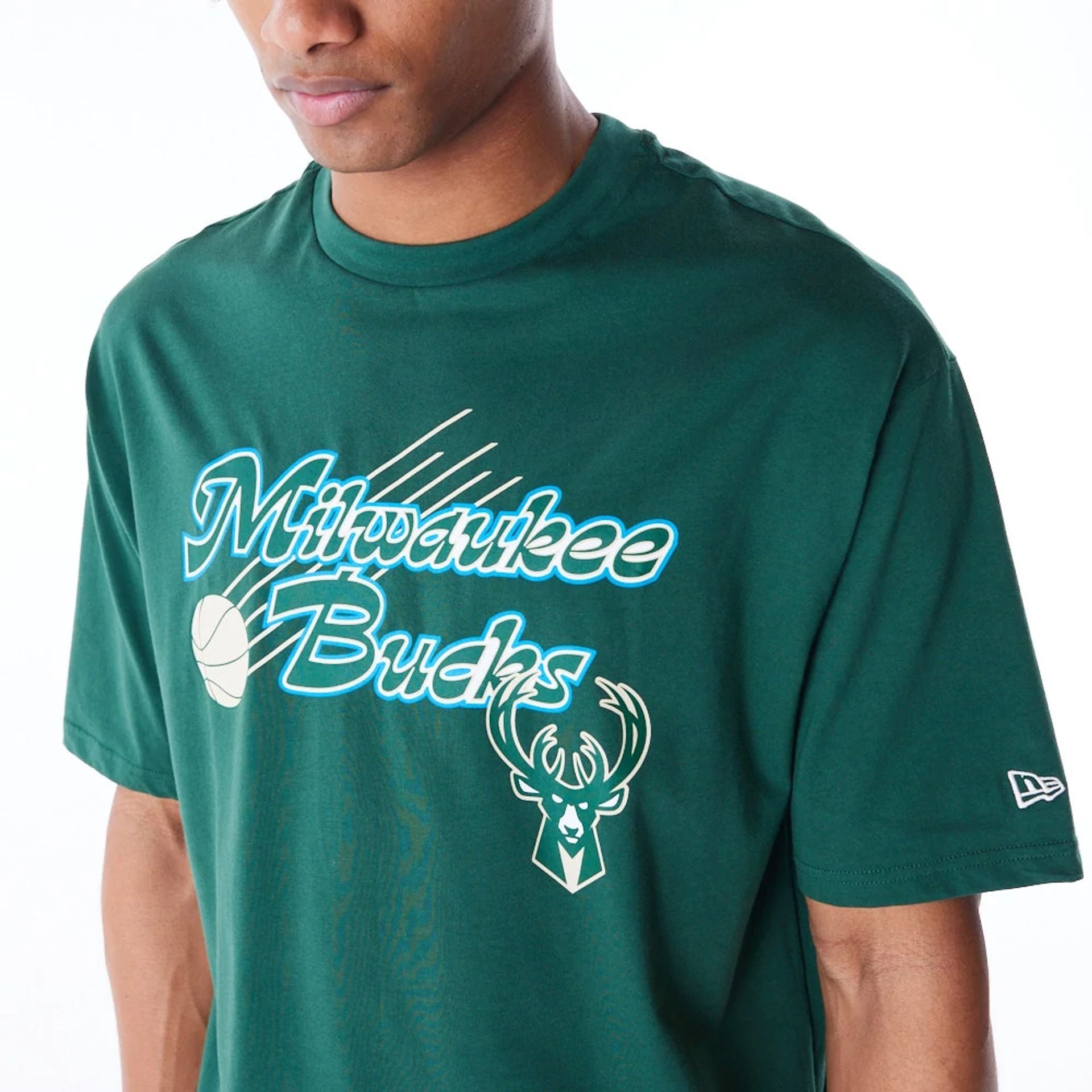 The Male model is wearing Milwaukee Bucks NBA Script Dark Green Oversized T-Shirt 2