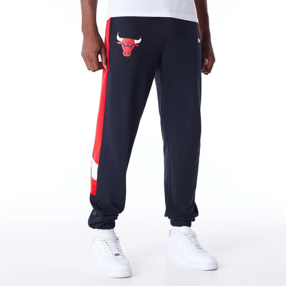 The Male model is wearing Chicago Bulls NBA Panel Black Fleece Joggers  7