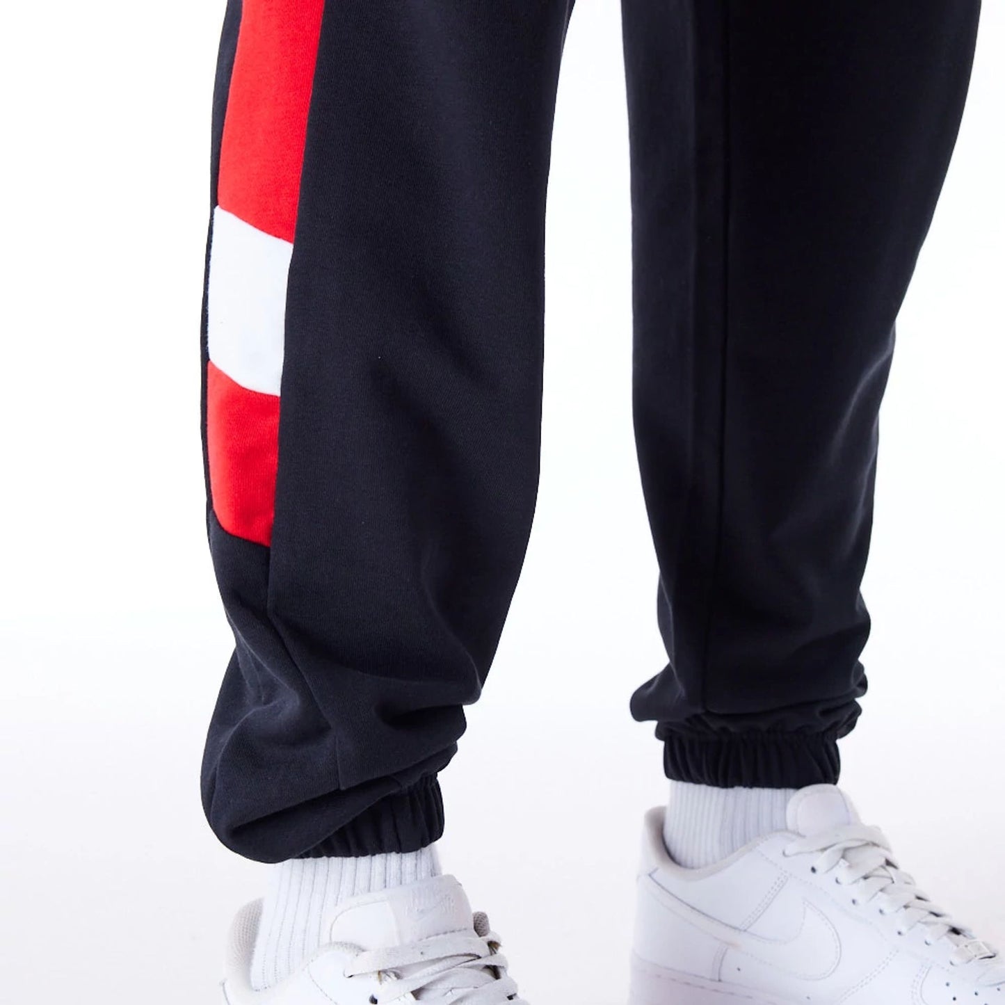 The Male model is wearing Chicago Bulls NBA Panel Black Fleece Joggers  4