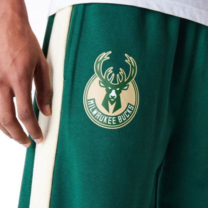 The Male model is wearing Milwaukee Bucks NBA Panel Dark Green Fleece Joggers 8