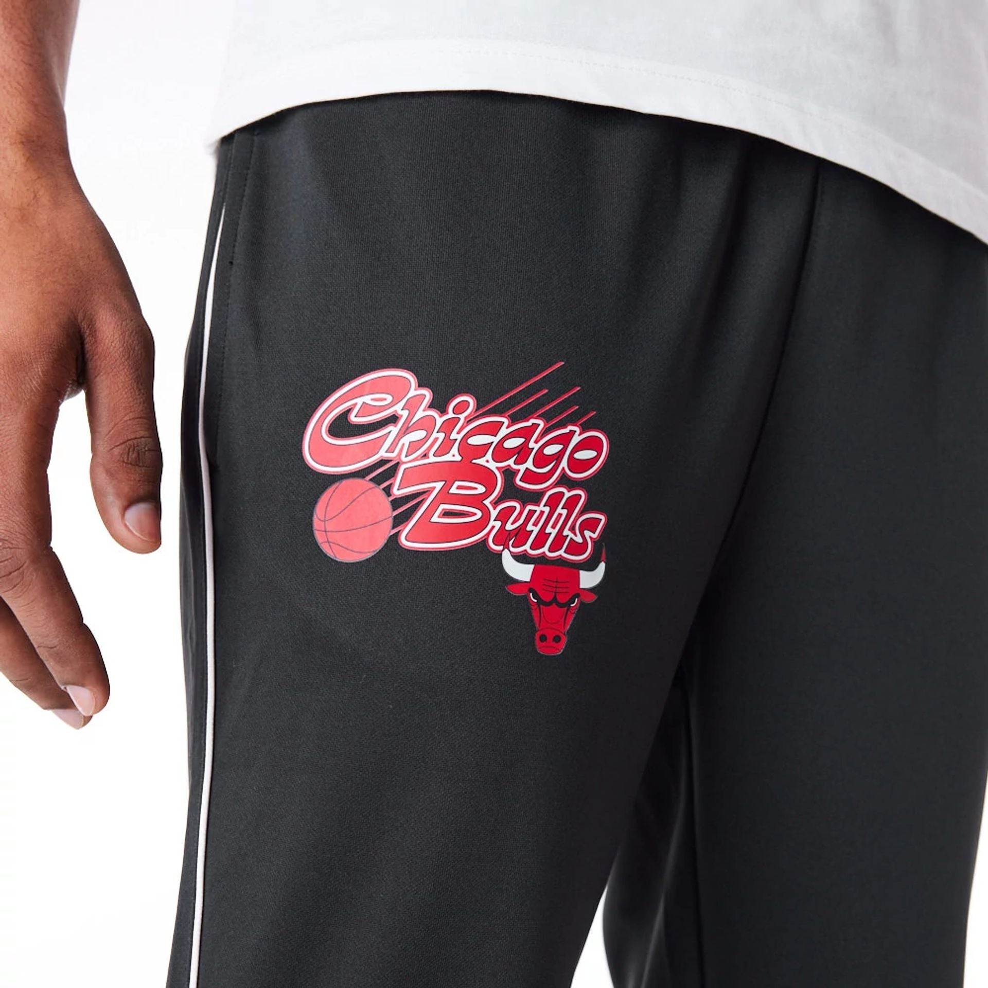 The Male model is wearing Chicago Bulls NBA Script Black Fleece Track Joggers 2