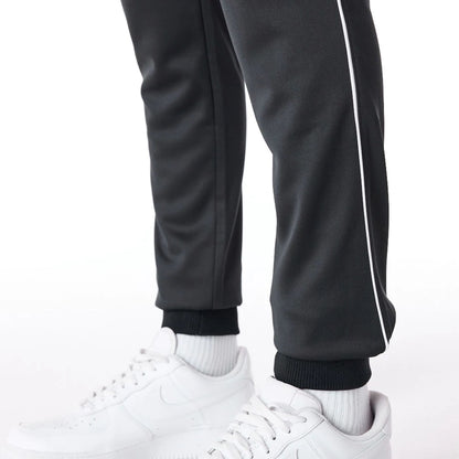 The Male model is wearing Chicago Bulls NBA Script Black Fleece Track Joggers 6