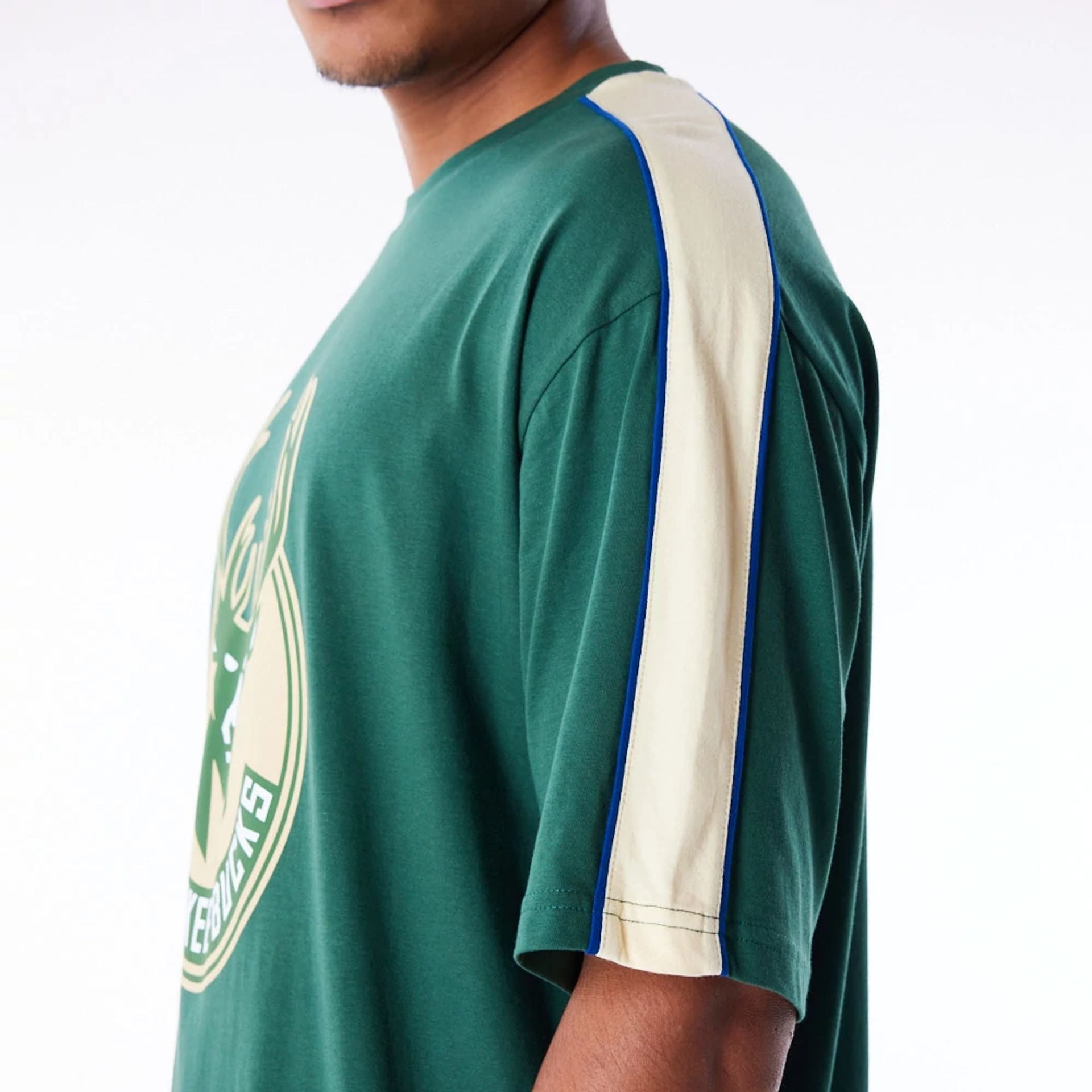 The Male model is wearing Milwaukee Bucks NBA Panel Dark Green Oversized T-Shirt 7