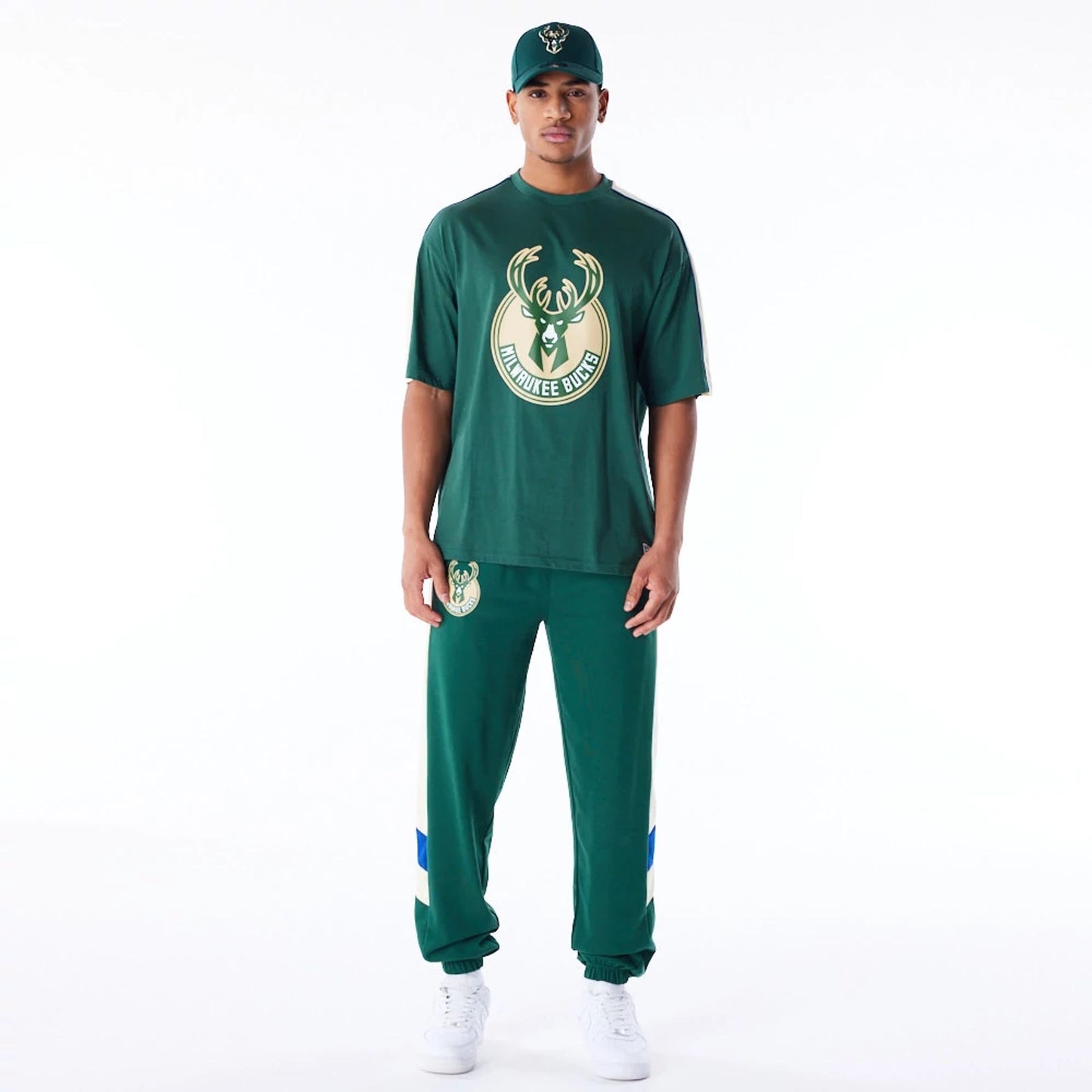 The Male model is wearing Milwaukee Bucks NBA Panel Dark Green Oversized T-Shirt 9