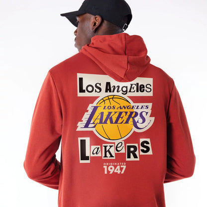 The Male model is wearing LA Lakers Newspaper Graphic Red Pullover Hoodie 3