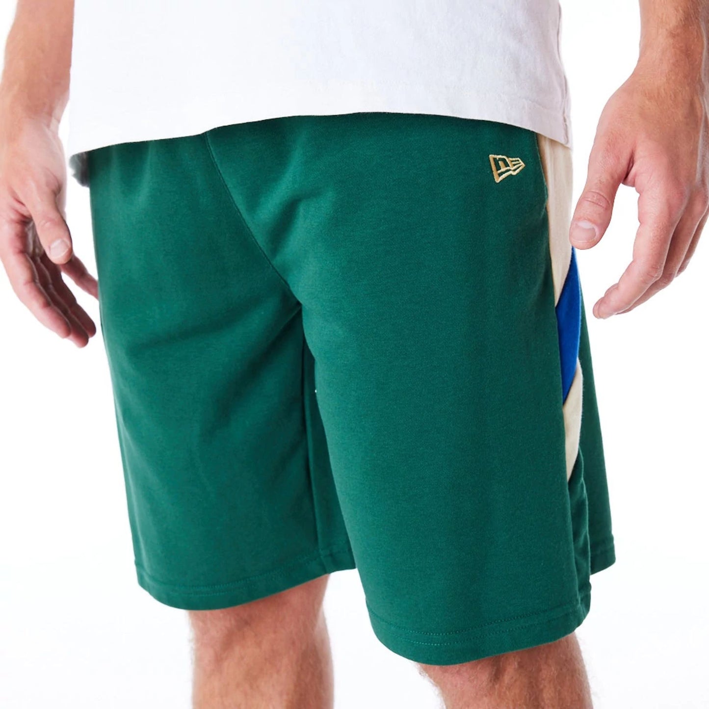 The Male model is wearing Milwaukee Bucks NBA Panel Dark Green Oversized Shorts 6